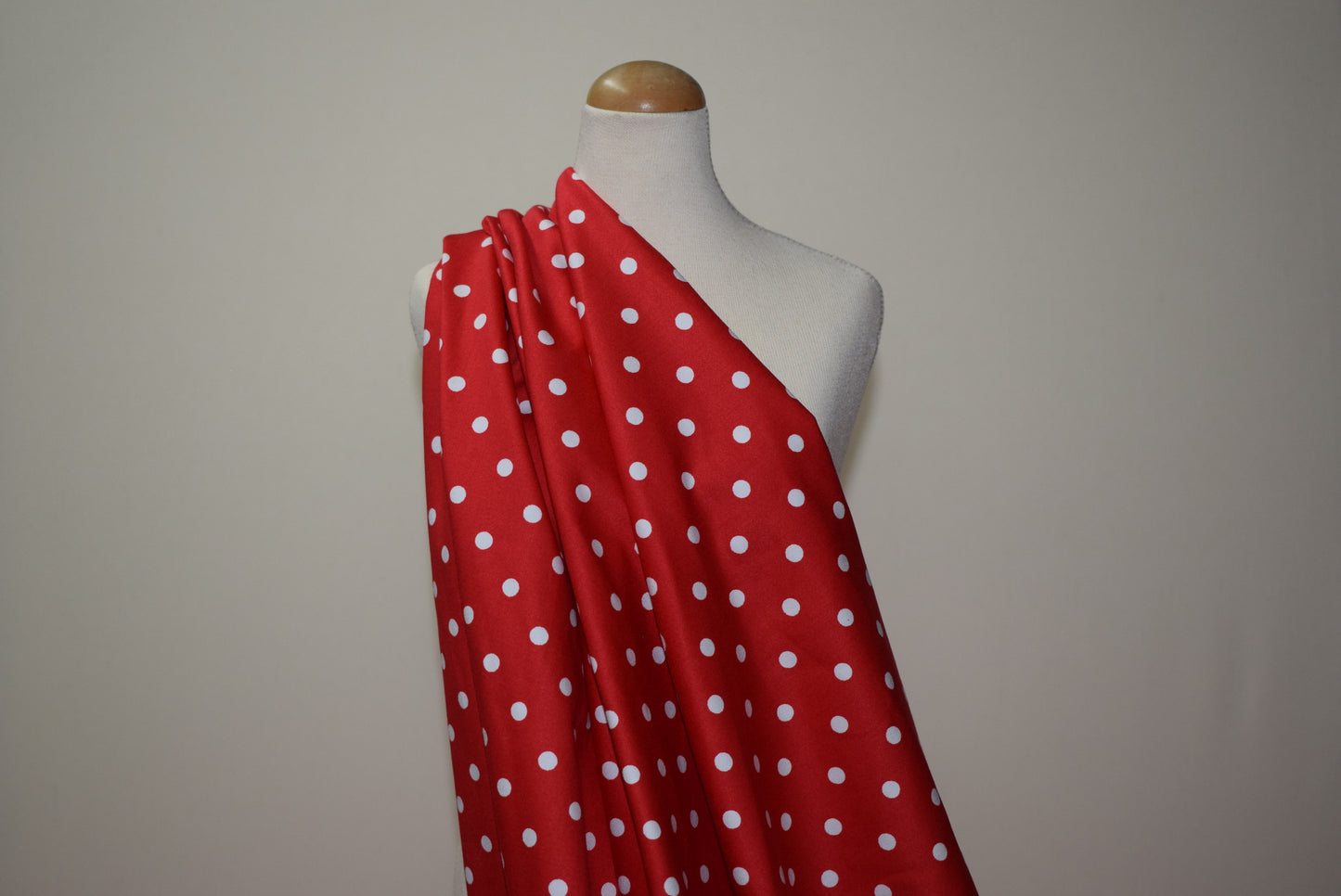 White spot on red stretch sateen