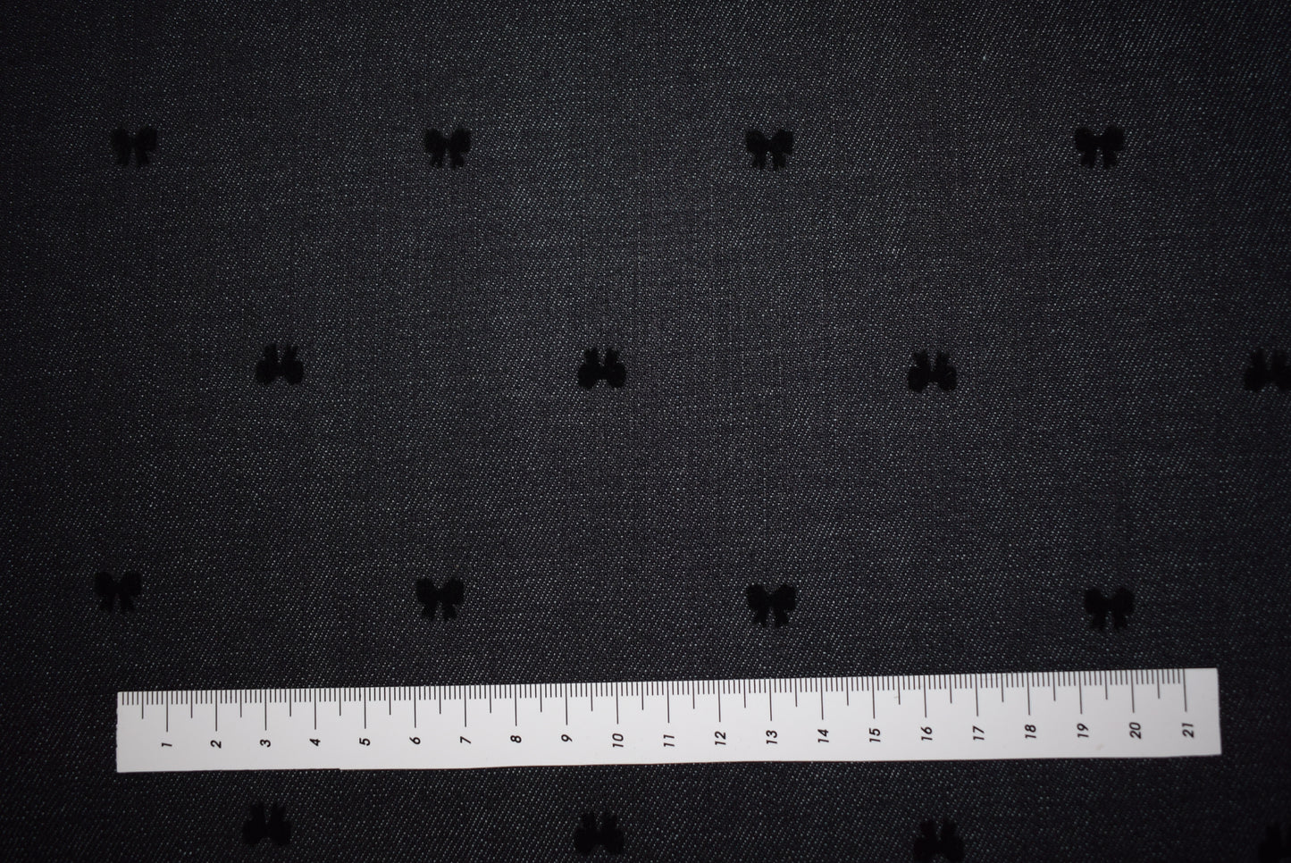Black Flock Bows On Denim