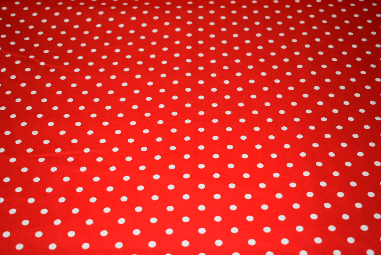 White spot on red stretch sateen